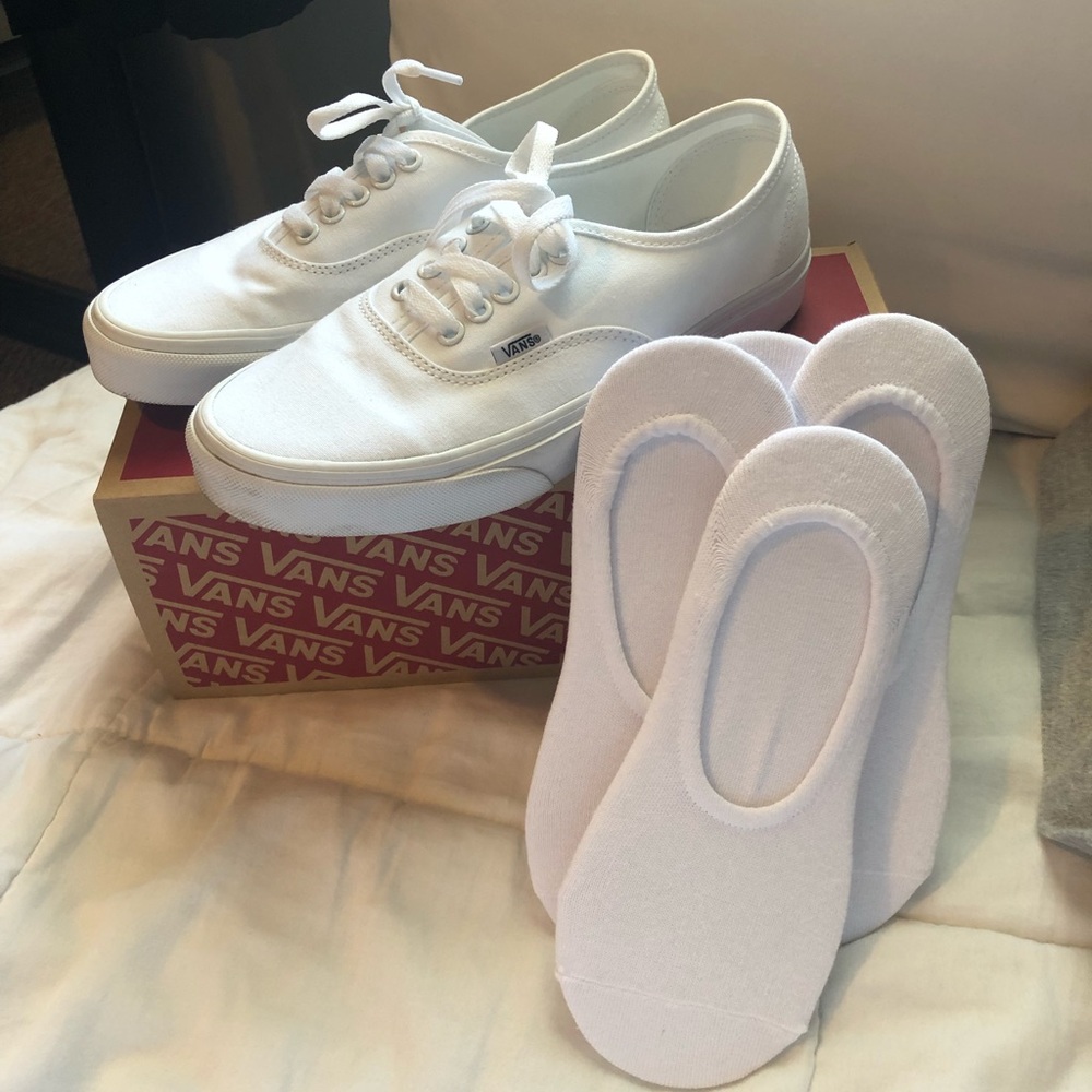 woman’s white authentic vans